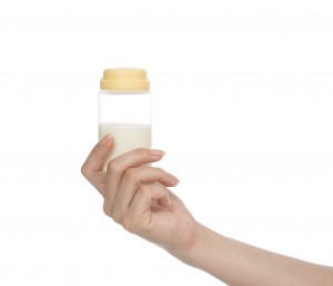 Child baby feeding bottle container with milk